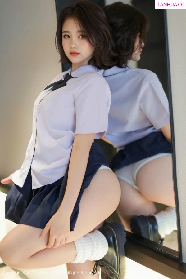   [XiuRen]高清写真图 2025.03.07 No.9985 小橘子orange 美腿性感第22张图片